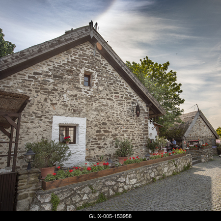 Tihany is a village on the northern shore of Lake Balaton on the Tihany Peninsula (Hungary, Veszprém County). The whole peninsula is a historical district.The center of the district is the Benedictine Tihany Abbey, which was founded in 1055 AD by András (Andrew) I, who is buried in the crypt. The founding charter of this abbey is the first extant record of Hungarian language, preserved in Pannonhalma Benedictine Archabbey. The church itself was rebuilt in baroque style in 1754. The still functioning abbey is a popular tourist attraction due to its historical and artistic significance. It also has the best view of Lake Balaton.-stock-foto