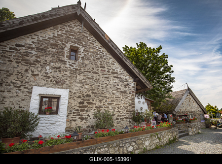 Tihany is a village on the northern shore of Lake Balaton on the Tihany Peninsula (Hungary, Veszprém County). The whole peninsula is a historical district.The center of the district is the Benedictine Tihany Abbey, which was founded in 1055 AD by András (Andrew) I, who is buried in the crypt. The founding charter of this abbey is the first extant record of Hungarian language, preserved in Pannonhalma Benedictine Archabbey. The church itself was rebuilt in baroque style in 1754. The still functioning abbey is a popular tourist attraction due to its historical and artistic significance. It also has the best view of Lake Balaton.-stock-foto