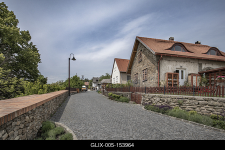 Tihany is a village on the northern shore of Lake Balaton on the Tihany Peninsula (Hungary, Veszprém County). The whole peninsula is a historical district.The center of the district is the Benedictine Tihany Abbey, which was founded in 1055 AD by András (Andrew) I, who is buried in the crypt. The founding charter of this abbey is the first extant record of Hungarian language, preserved in Pannonhalma Benedictine Archabbey. The church itself was rebuilt in baroque style in 1754. The still functioning abbey is a popular tourist attraction due to its historical and artistic significance. It also has the best view of Lake Balaton.-stock-foto