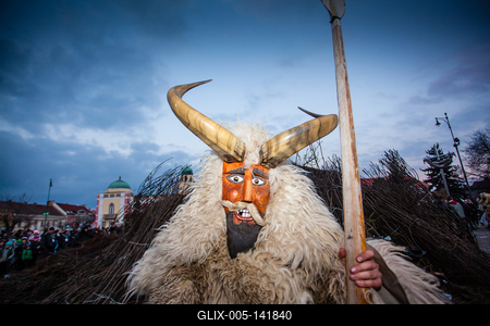 MOHACS, HUNGARY - FEBRUARY 17: Unidentified people in mask participants at the Mohacsi Busojaras, it is a carnival for spring greetings) February 17, 2015 in Mohacs, Hungary.-stock-foto