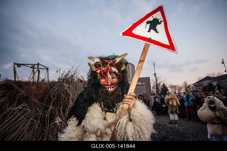 MOHACS, HUNGARY - FEBRUARY 17: Unidentified people in mask participants at the Mohacsi Busojaras, it is a carnival for spring greetings) February 17, 2015 in Mohacs, Hungary.-stock-foto