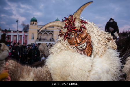 MOHACS, HUNGARY - FEBRUARY 17: Unidentified people in mask participants at the Mohacsi Busojaras, it is a carnival for spring greetings) February 17, 2015 in Mohacs, Hungary.-stock-foto