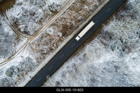 Truck on road with snowy forest in Hungary-stock-foto