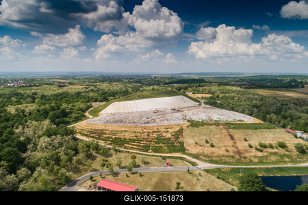 Garbage trucks unload garbage to a landfill, drone photo-stock-foto