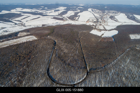 road with snowy forest in Hungary-stock-foto