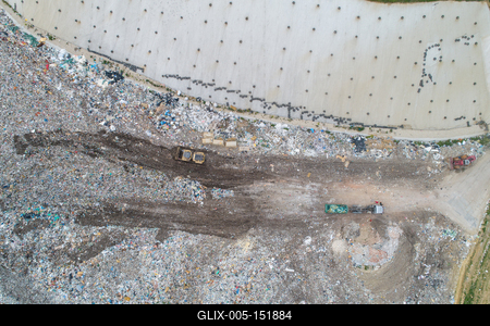 Garbage trucks unload garbage to a landfill, drone photo-stock-foto