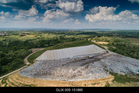 Garbage trucks unload garbage to a landfill, drone photo-stock-foto
