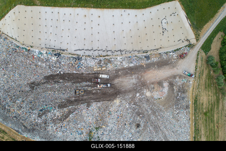 Garbage trucks unload garbage to a landfill, drone photo-stock-foto