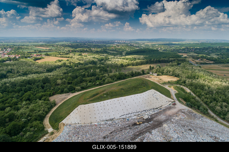 Garbage trucks unload garbage to a landfill, drone photo-stock-foto