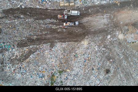 Garbage trucks unload garbage to a landfill, drone photo-stock-foto