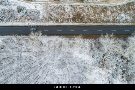 road with snowy forest in Hungary-stock-foto