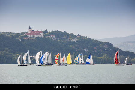 SZANTOD - JULY 18 : Sailing boats compete on 51.th Kekszalag championship at the Lake Balaton on 18 July 2019 in Szantod, Hungary.-stock-foto