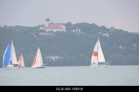 SZANTOD - JULY 18 : Sailing boats compete on 51.th Kekszalag championship at the Lake Balaton on 18 July 2019 in Szantod, Hungary.-stock-foto