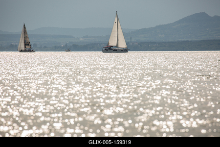SZANTOD - JULY 18 : Sailing boats compete on 51.th Kekszalag championship at the Lake Balaton on 18 July 2019 in Szantod, Hungary.-stock-foto