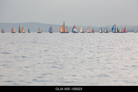 SZANTOD - JULY 18 : Sailing boats compete on 51.th Kekszalag championship at the Lake Balaton on 18 July 2019 in Szantod, Hungary.-stock-foto