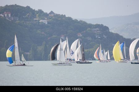 SZANTOD - JULY 18 : Sailing boats compete on 51.th Kekszalag championship at the Lake Balaton on 18 July 2019 in Szantod, Hungary.-stock-foto