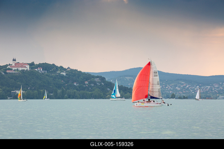 SZANTOD - JULY 18 : Sailing boats compete on 51.th Kekszalag championship at the Lake Balaton on 18 July 2019 in Szantod, Hungary.-stock-foto