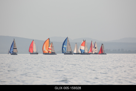 SZANTOD - JULY 18 : Sailing boats compete on 51.th Kekszalag championship at the Lake Balaton on 18 July 2019 in Szantod, Hungary.-stock-foto