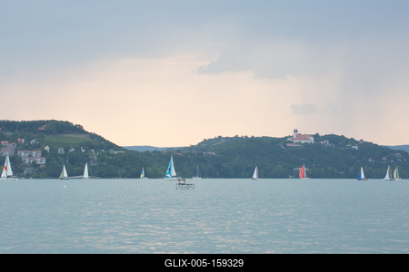 SZANTOD - JULY 18 : Sailing boats compete on 51.th Kekszalag championship at the Lake Balaton on 18 July 2019 in Szantod, Hungary.-stock-foto