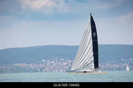 SZANTOD - JULY 18 : Sailing boats compete on 51.th Kekszalag championship at the Lake Balaton on 18 July 2019 in Szantod, Hungary.-stock-foto