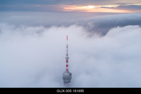 TV tower with cloudy and foggy sky-stock-foto