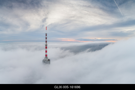 TV tower with cloudy and foggy sky-stock-foto