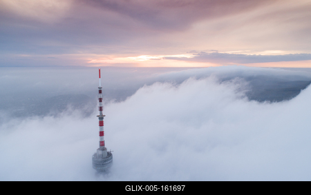 TV tower with cloudy and foggy sky-stock-foto