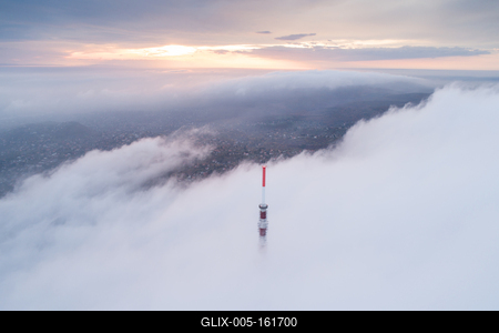 TV tower with cloudy and foggy sky-stock-foto