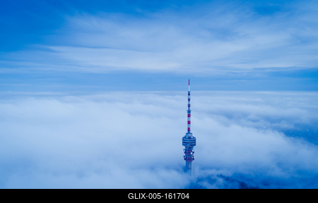 TV tower with cloudy and foggy sky-stock-foto