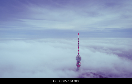 TV tower with cloudy and foggy sky-stock-foto