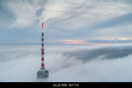 TV tower with cloudy and foggy sky-stock-foto
