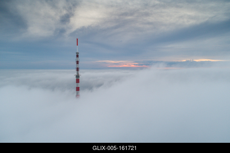 TV tower with cloudy and foggy sky-stock-foto