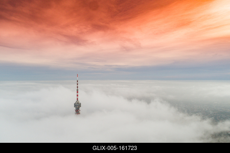 TV tower with cloudy and foggy sky-stock-foto