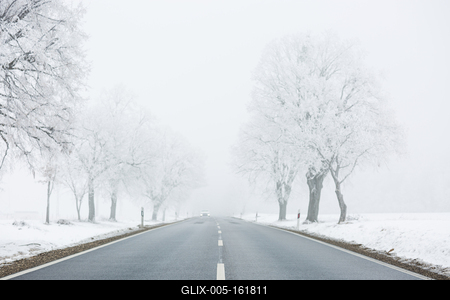 winter warning sign with snow-stock-foto