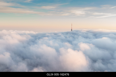 TV tower with cloudy and foggy sky-stock-foto