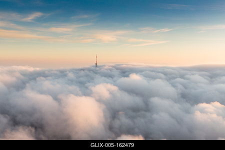 TV tower with cloudy and foggy sky-stock-foto