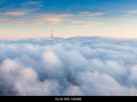 TV tower with cloudy and foggy sky-stock-foto