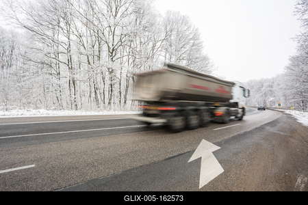 snowy road at cold wintertime-stock-foto