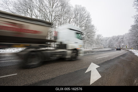 snowy road at cold wintertime-stock-foto