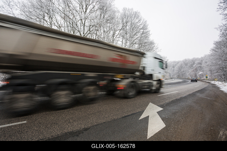 snowy road at cold wintertime-stock-foto