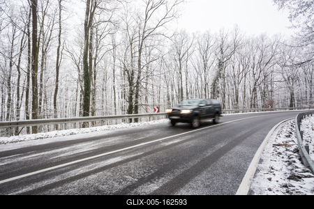 snowy road at cold wintertime-stock-foto