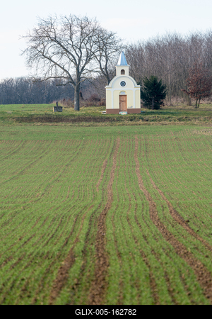 small chapel with a tree-stock-foto