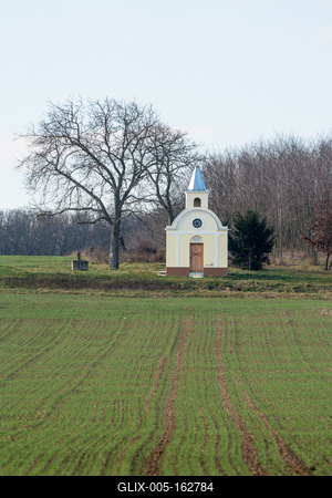small chapel with a tree-stock-foto