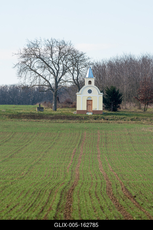 small chapel with a tree-stock-foto