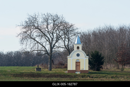 small chapel with a tree-stock-foto