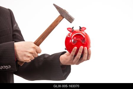 businessman break his red piggybank-stock-foto