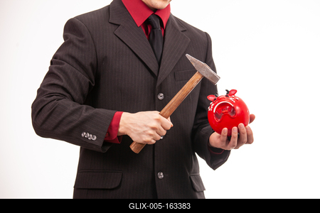 businessman break his red piggybank-stock-foto