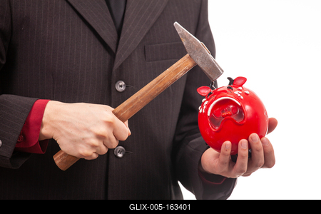 businessman break his red piggybank-stock-foto