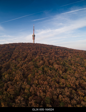 TV tower in Pecs Hungary with Mecsek hills-stock-foto