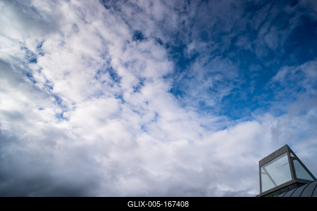 roof windows on a modern building  with cloudy sky-stock-foto